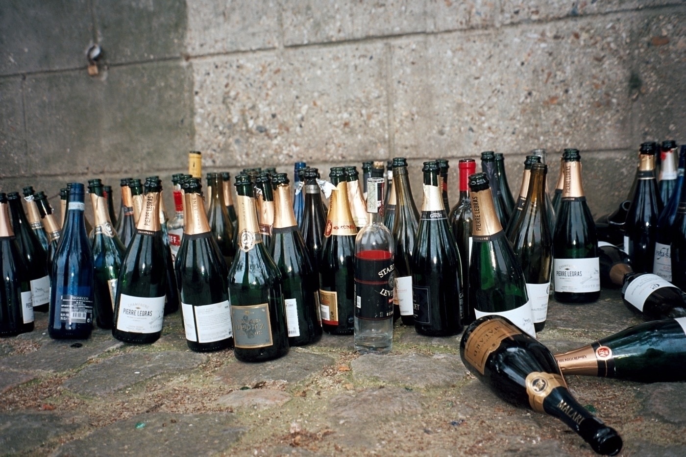 Wine bottles on the street. Photo taken with Leica Z2X in Paris by Josh Withers.